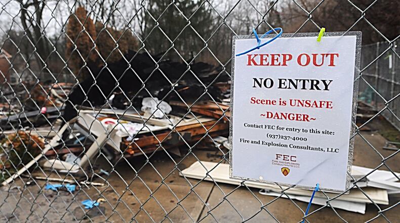 The site of a fatal house explosion on North Claridge Drive in Kettering is fenced in while the investigation into the cause is ongoing. MARSHALL GORBY/STAFF