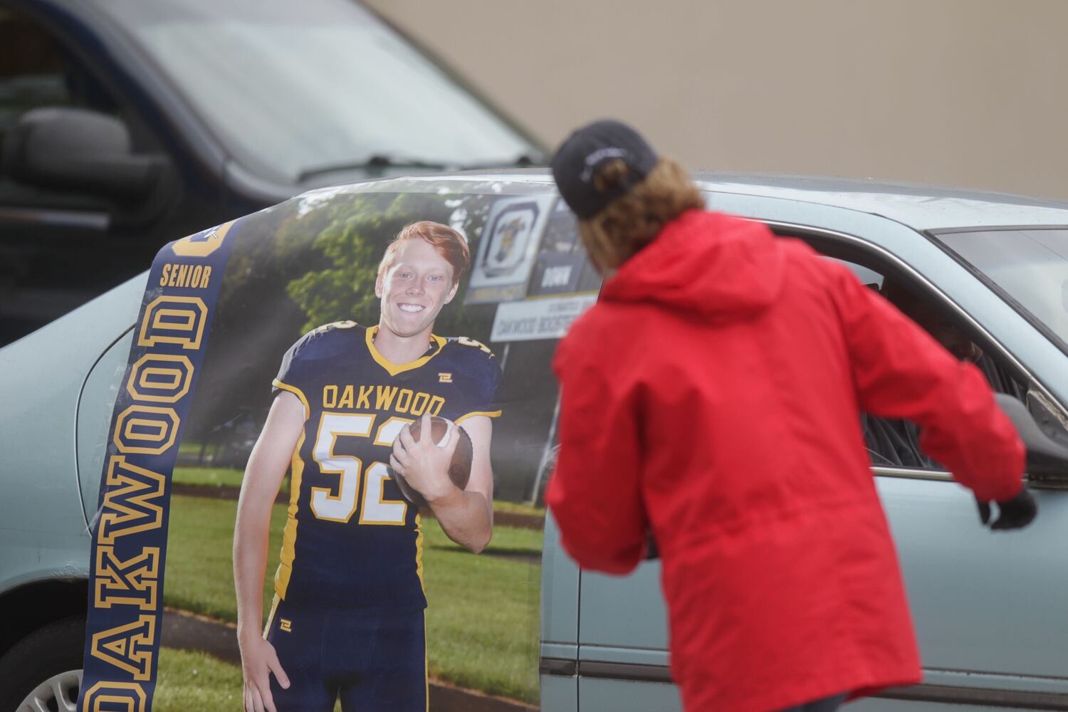 PHOTOS: Oakwood seniors receive gowns, diplomas during drive-thru celebration