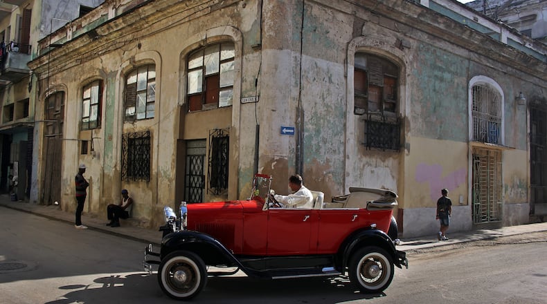 A car manufactured almost a century ago drives on a street in Havana, Cuba on Aug. 1, 2018. (Alejandro Ernesto/Zuma Press/TNS)