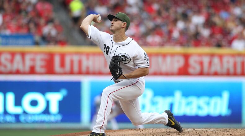 Reds starter Tyler Mahle pitches against the Rangers on Friday, June 14, 2019, at Great American Ball Park in Cincinnati. David Jablonski/Staff