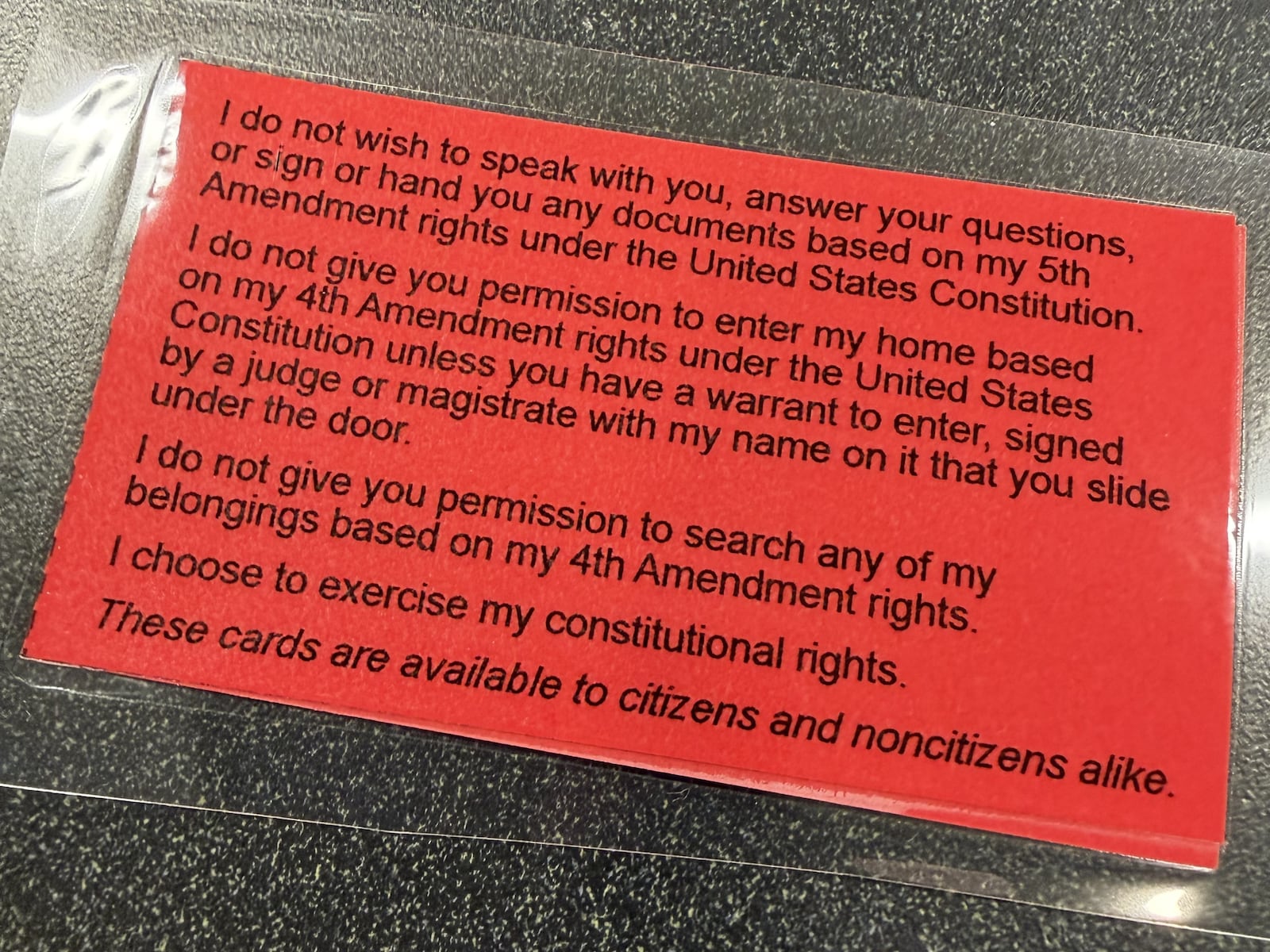 Whistle kits included pamphlets on protest best practices and a "Know Your Rights" card printed in English and other languages. SYDNEY DAWES/STAFF