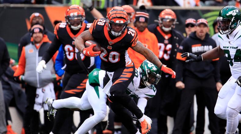 CINCINNATI, OHIO - DECEMBER 01: Joe Mixon #28 of the Cincinnati Bengals runs with the ball during the game against the New York Jets at Paul Brown Stadium on December 01, 2019 in Cincinnati, Ohio. (Photo by Andy Lyons/Getty Images)