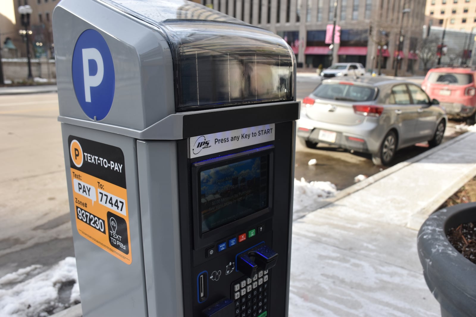 The city of Dayton has installed new parking pay stations on the first blocks of North Main and East and West Third streets in downtown. CORNELIUS FROLIK / STAFF