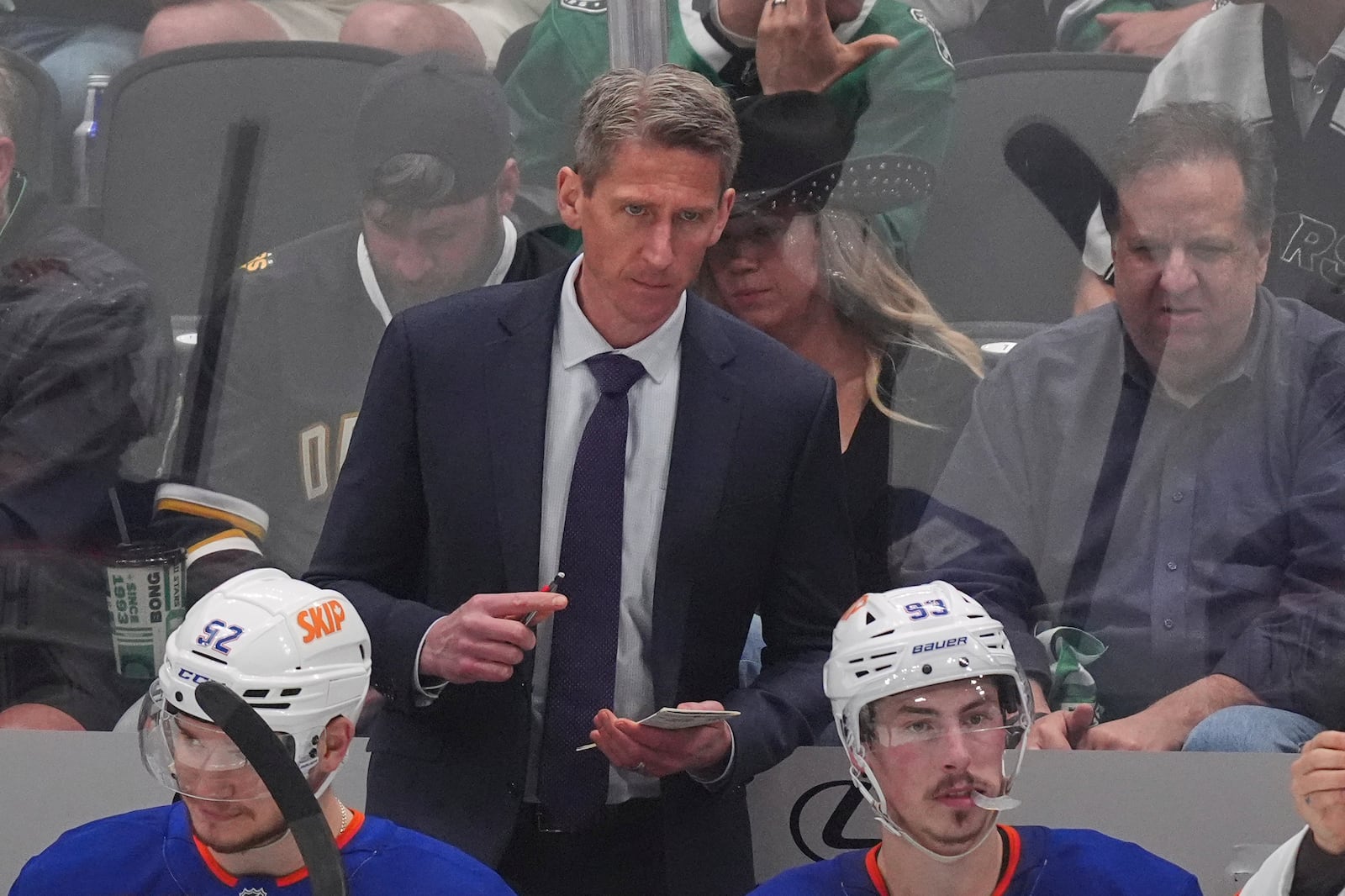 Edmonton Oilers head coach Kris Knoblauch looks on from the bench during the third period in Game 1 of the Western Conference finals in the NHL hockey Stanley Cup playoffs against the Dallas Stars, Wednesday, May 21, 2025, in Dallas. (AP Photo/LM Otero)
