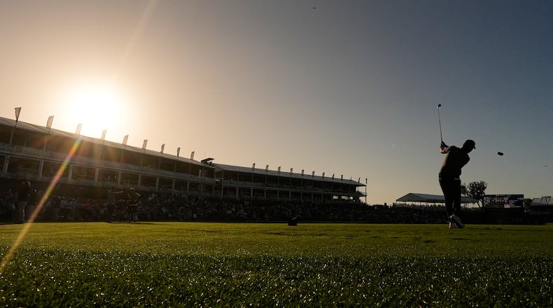 Si Woo Kim of South Korea drives off the 17th tee during the second round of The Players Championship golf tournament Friday, March 13, 2026, in Ponte Vedra Beach, Fla. (AP Photo/Gerald Herbert)