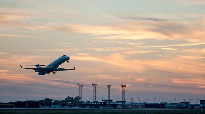 A jet airplane takes off at the Dayton International Airport on Wednesday Dec. 11, 2019.