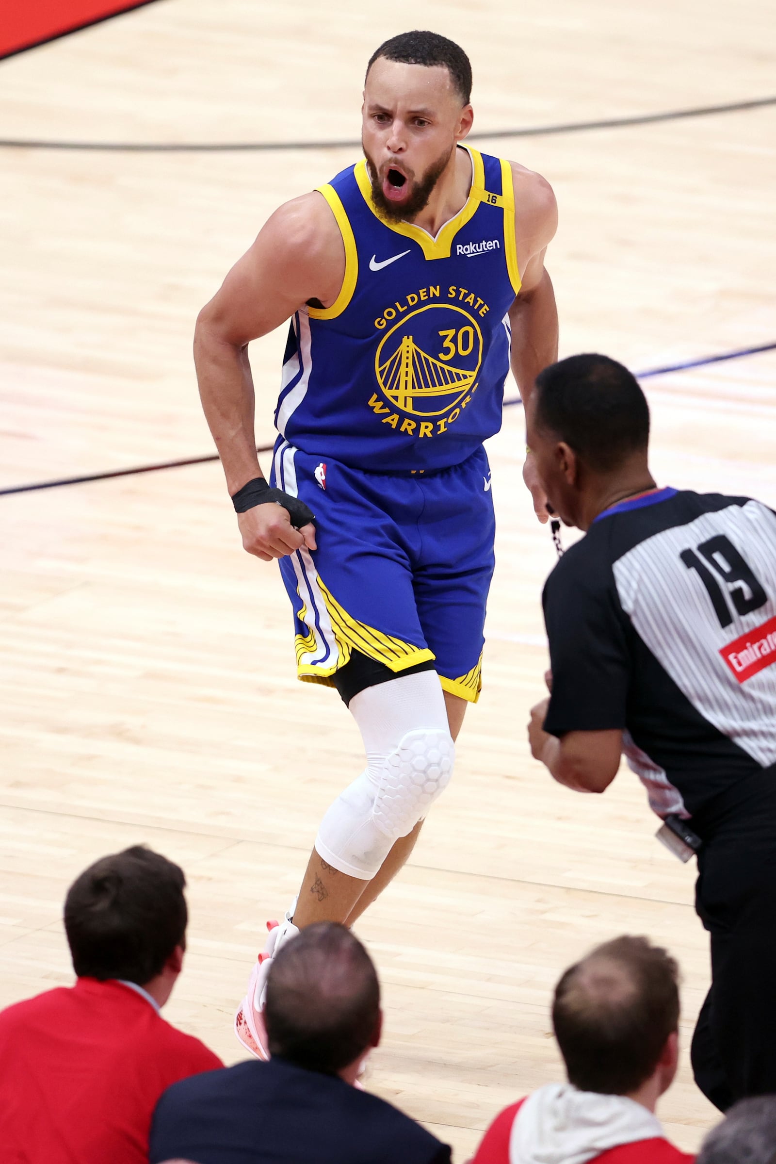 Golden State Warriors' Stephen Curry reacts a 3-pointer against the Houston Rockets during the second half of Game 1 of an NBA basketball first-round playoff series in Houston, Sunday, April 20, 2025. (Scott Strazzante/San Francisco Chronicle via AP)
