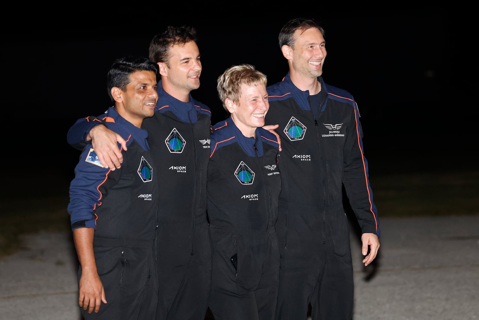 SpaceX Falcon 9 crew pose for a photo before departing for a launch to the International Space Station at the Kennedy Space Center in Cape Canaveral, Fla., Tuesday, June 24, 2025. (AP Photo/Terry Renna)