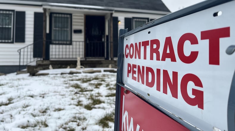 A home in northwest Dayton that was recently listed for sale online for $69,999. The home has a contract pending. CORNELIUS FROLIK / STAFF