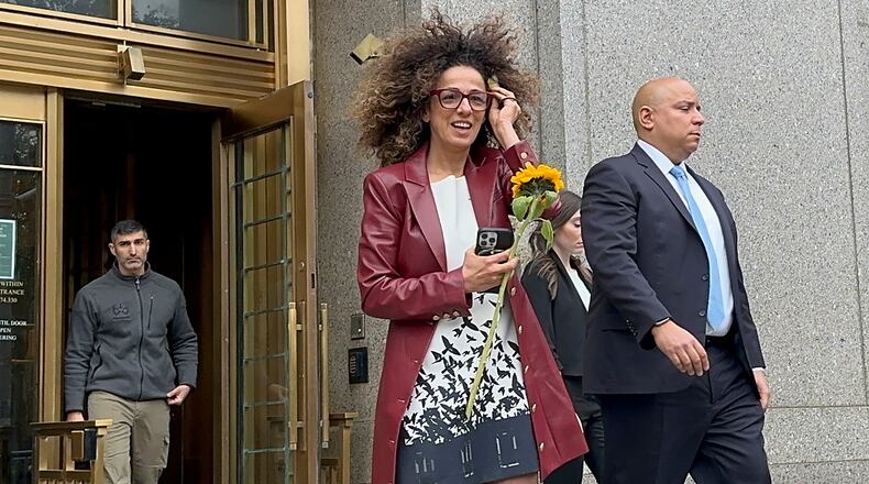 Iranian American journalist Masih Alinejad walks out of Manhattan federal court, Wednesday, Oct. 29, 2025, in New York, after two Russian mobsters were sentenced to 25 years in prison for agreeing to attempt to assassinate her. (AP Photo/Larry Neumeister)