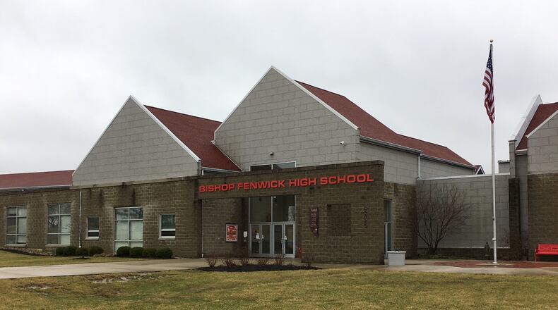 The preliminary cause of death of an elderly woman whose body was found before school started Wednesday at Bishop Fenwick High School is believed to be from hypothermia, according to the Warren County Coroner's Office.  ED RICHTER/STAFF
Bishop Fenwick High School was on a “soft lockdown” this morning, meaning classes were conducted but no one was allowed to enter or leave the school, officials said. ED RICHTER/STAFF