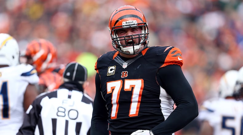 CINCINNATI, OH - JANUARY 05: Tackle Andrew Whitworth #77 of the Cincinnati Bengals reacts against the San Diego Chargers during a Wild Card Playoff game at Paul Brown Stadium on January 5, 2014 in Cincinnati, Ohio. (Photo by Andy Lyons/Getty Images)