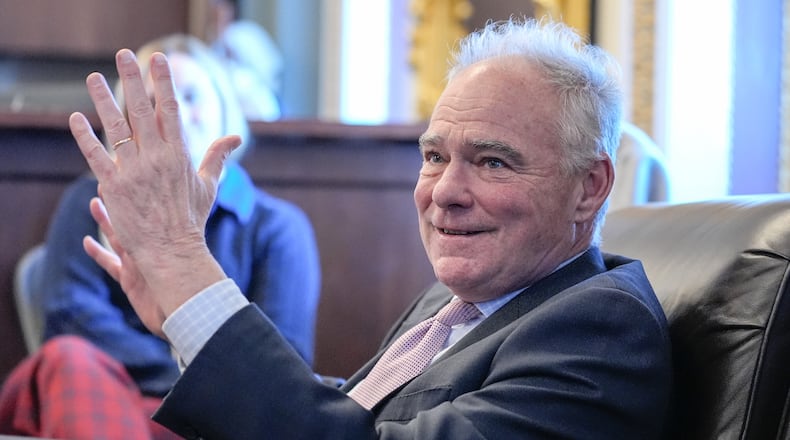 Sen. Tim Kaine, D-Va., speaks to reporters about a war powers resolution regarding Venezuela on Capitol Hill, Wednesday, Jan. 7, 2026, in Washington. (AP Photo/Mariam Zuhaib)