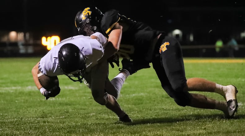 Shawnee High School sophomore Zain Deweese tackles Graham sophomore Jakob Hoke during their game on Friday, Oct. 10 in Springfield. The Falcons won 42-7. CONTRIBUTED PHOTO