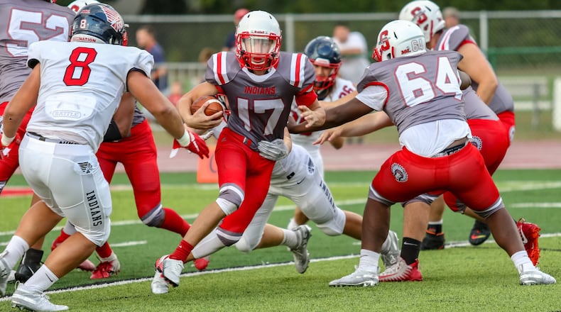 Stebbins High School quarterback Nate Keller (17) carries the ball during their game against Piqua on Thursday night at Edmundson Stadium. Piqua won the game 27-10. CONTRIBUTED PHOTO BY MICHAEL COOPER
