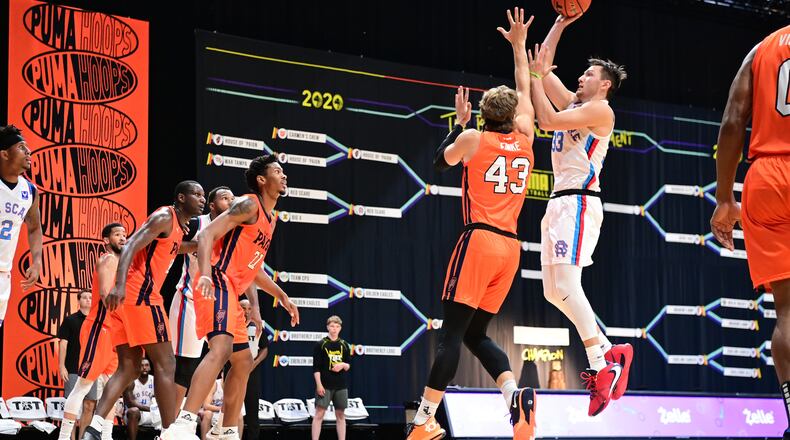 Ryan Mikesell os Red Scare puts up a shot vs. House of 'Paign in last year's TBT. Ben Solomon/CONTRIBUTED