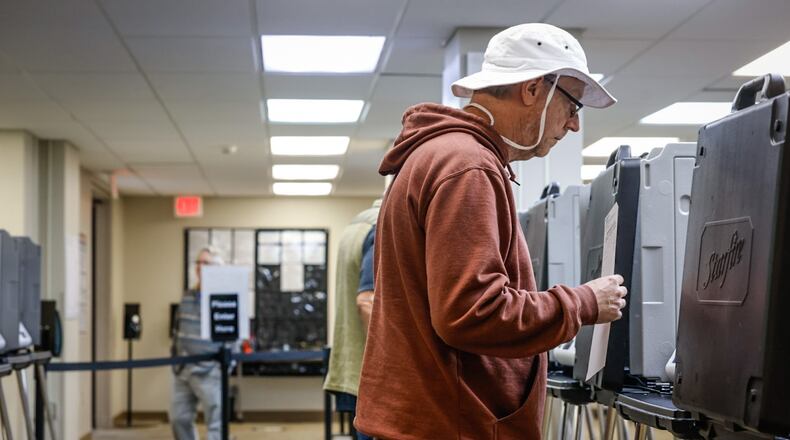 Jerry Wright cast his early votes at the Montgomery County Board of Elections Wednesday Oct. 11, 2023. JIM NOELKER/STAFF