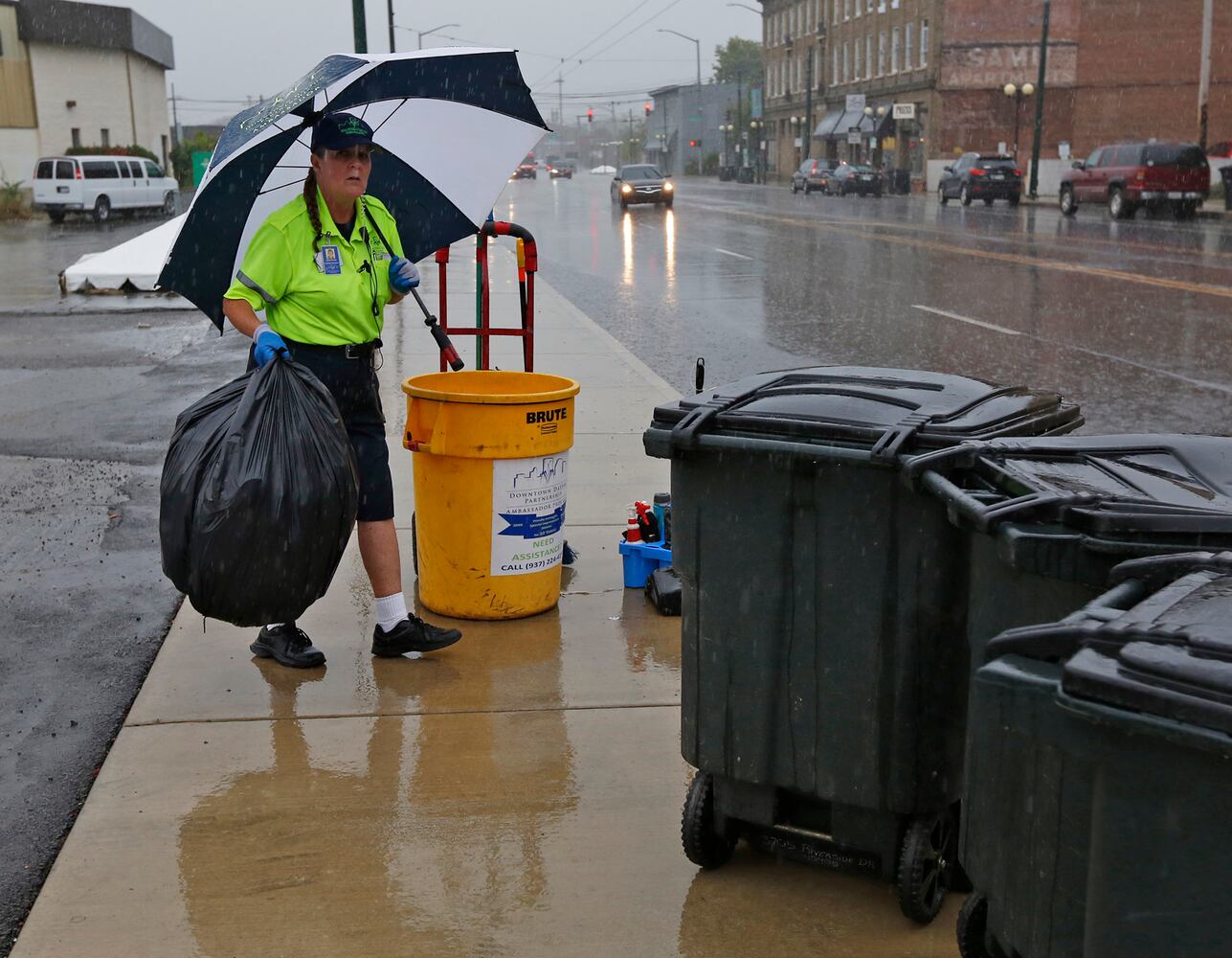 PHOTOS: Crews, party guests work to clean up Oregon District after Gem City Shine block party