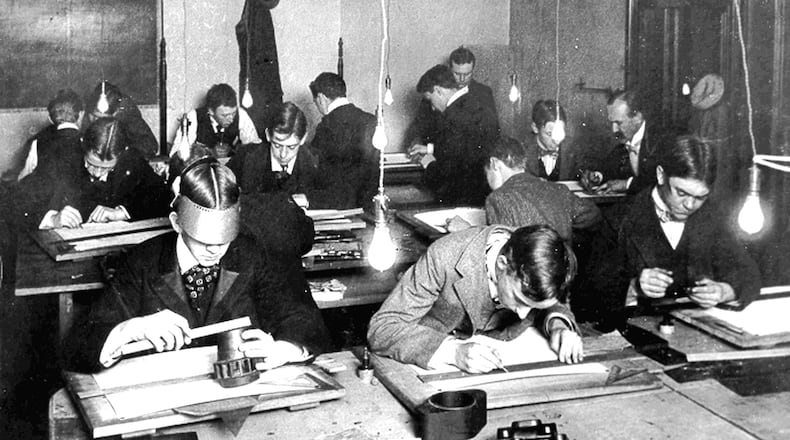 David Sinclair, top right, teaches mechanical drawing in 1888. DAYTON DAILY NEWS ARCHIVES