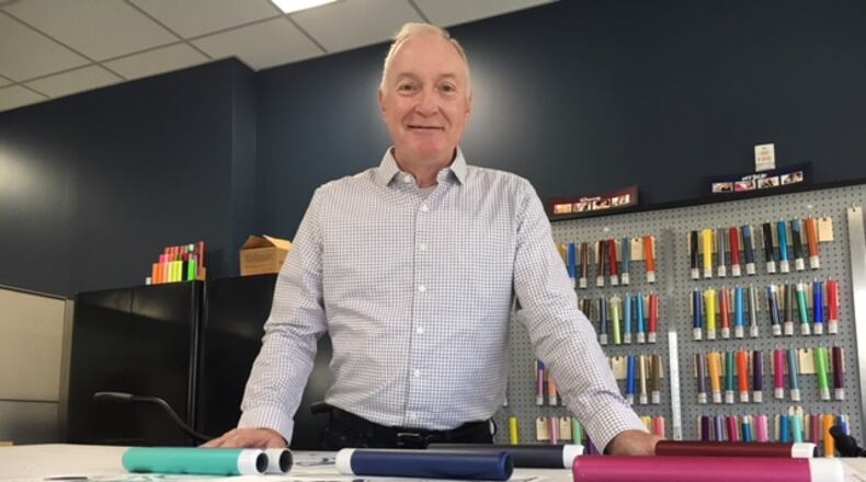 Bill Smith, president and chief executive of Huffy, stands amid new designs and color samples for upcoming Huffy bicycles in 2018. THOMAS GNAU/STAFF