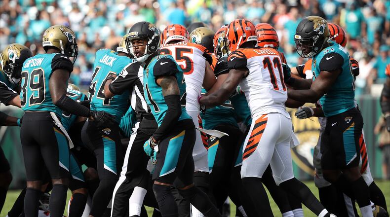 JACKSONVILLE, FL - NOVEMBER 05: Members of the Cincinnati Bengals and Jacksonville Jaguars get into a scrum at the end of the first half of their game at EverBank Field on November 5, 2017 in Jacksonville, Florida. (Photo by Logan Bowles/Getty Images)