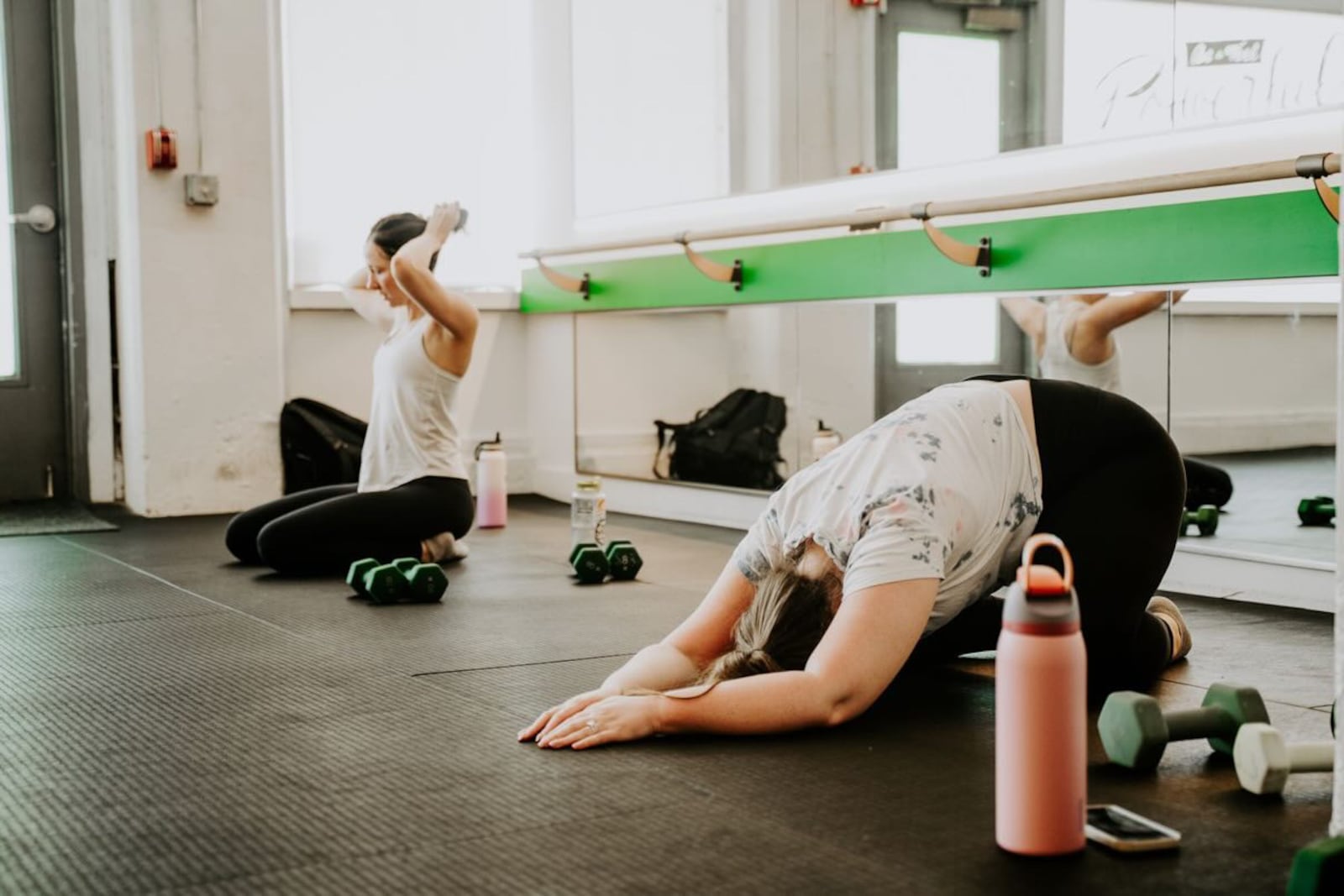 A group exercise class at Space Three featuring floor based stretching and recovery movements. CONTRIBUTED