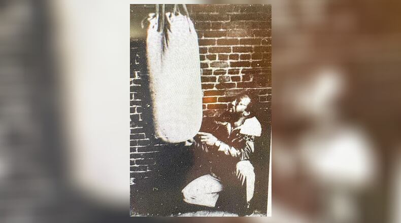 Johnny Lytle poses next to a heavy bag in the 1970s. A great pal of world featherweight champ, Davey Moore, he was a boxer of much promise himself from 1949-1955. He went 50-3 as an amateur, winning two Dayton Daily News Golden Glove titles and advancing once to the Nationals in Chicago. He turned pro and briefly served as Moore’s sparring partner before turning full-time to music. DAYTON DAILY NEWS FILE ART