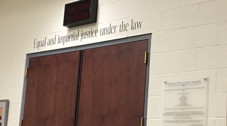 The Warren County Juvenile Court trial of a 16-year-old Warren County boy related to a post he made on Snapchat after the school shooting in Parkland, Fla., was delayed Wednesday. STAFF/LAWRENCE BUDD