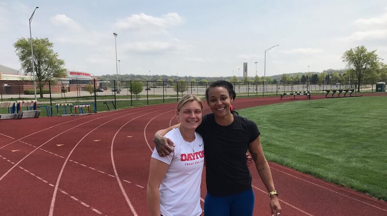 Former Olympian Chantae McMillan (on right), who has switched events from the heptathlon to the javelin throw in an effort to make the U.S. Olympic team headed to the Tokyo Games this summer, with her training partner, University Dayton sophomore standout Casey Bogues, who has now broken the UD record in the javelin throw for the past three meets in a row this season.  (Photo by Tom Archdeacon)