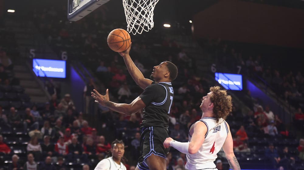 Dayton's Keonte Jones scores in the first half against Richmond on Tuesday, March 3, 2026, at the Robins Center in Richmond, Va. David Jablonski/Staff