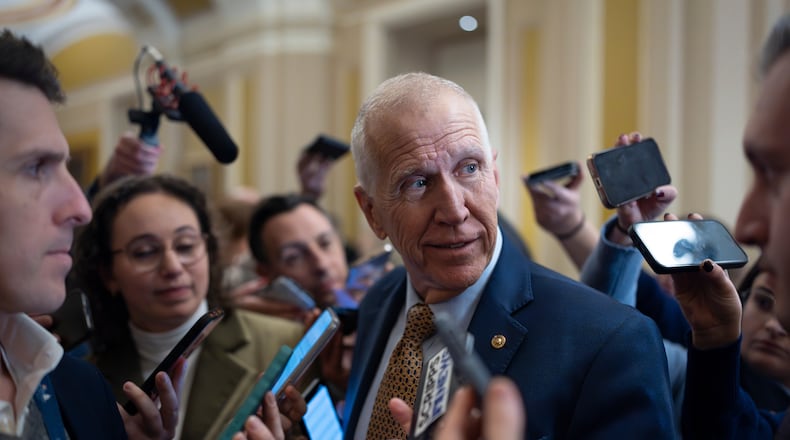 Sen. Thom Tillis, R-N.C., speaks with reporters following a closed-door meeting with fellow Republicans on spending legislation that funds the Department of Homeland Security and a swath of other government agencies, at the Capitol in Washington, Wednesday, Jan. 28, 2026. (AP Photo/J. Scott Applewhite)