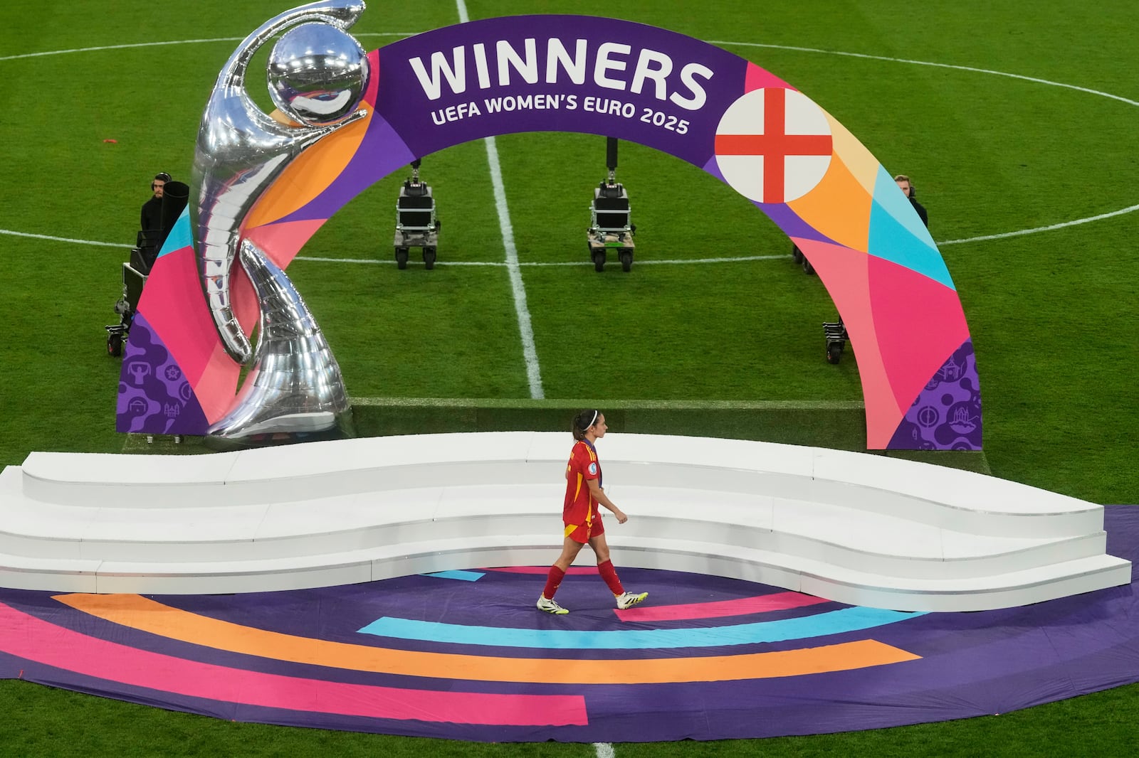 Spain's Aitana Bonmati walks away with her second place medal at the end of the Women's Euro 2025 final soccer match between England and Spain at St. Jakob-Park in Basel, Switzerland, Sunday, July 27, 2025. (AP Photo/Michael Probst)