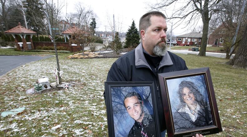 Brian Cooper shows photos of his son Corey and his friend Christina Jackson. Both were killed by a drunk driving traveling in excess of 90 mph in 2011. The Ohio Highway Patrol just released a video showing officers dealing with drunk driving over a 24-hour period. The video is aimed at bringing attention to the perils of drinking and getting behind the wheel. TY GREENLEES / STAFF