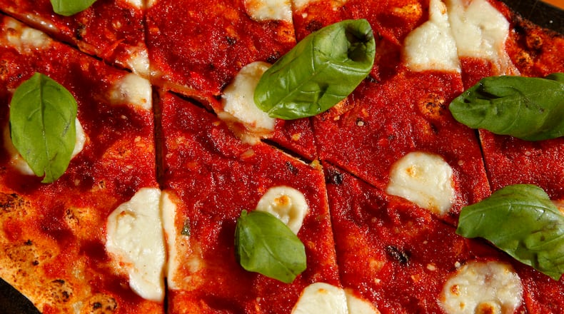 The Margherita Pizza at UNO Pizzeria & Grill. The restaurant has introduced new "Love All, Feed All" additions to their menu. The more than 50 unique menu items cater to diners seeking meals that are 600 calories or less, gluten free, carbohydrate conscious, vegan or vegetarian. LISA POWELL / STAFF