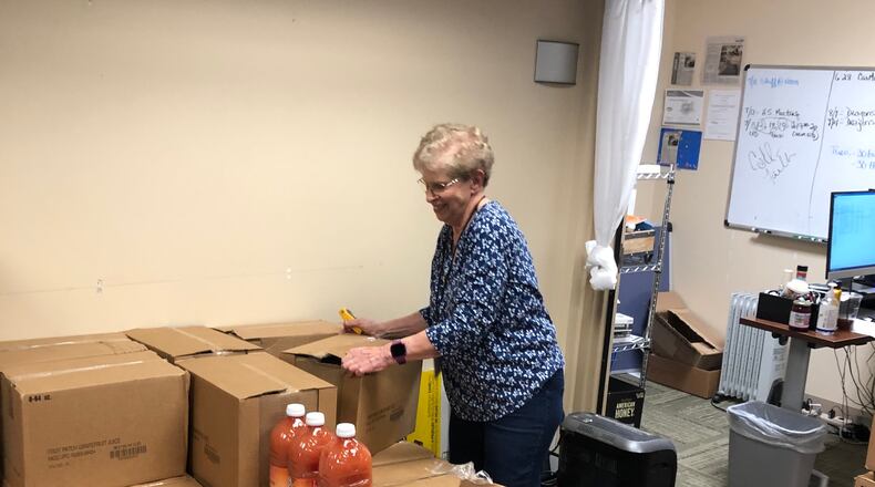 The volunteers and staff at Good Neighbor House work in the pantry, dental are, medical offices and the dispensary. CONTRIBUTED