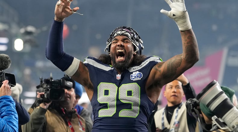 Seattle Seahawks defensive tackle Leonard Williams (99) reacts after NFL football divisional playoff game against the San Francisco 49ers, Saturday, Jan. 17, 2026, in Seattle. (AP Photo/Stephen Brashear)