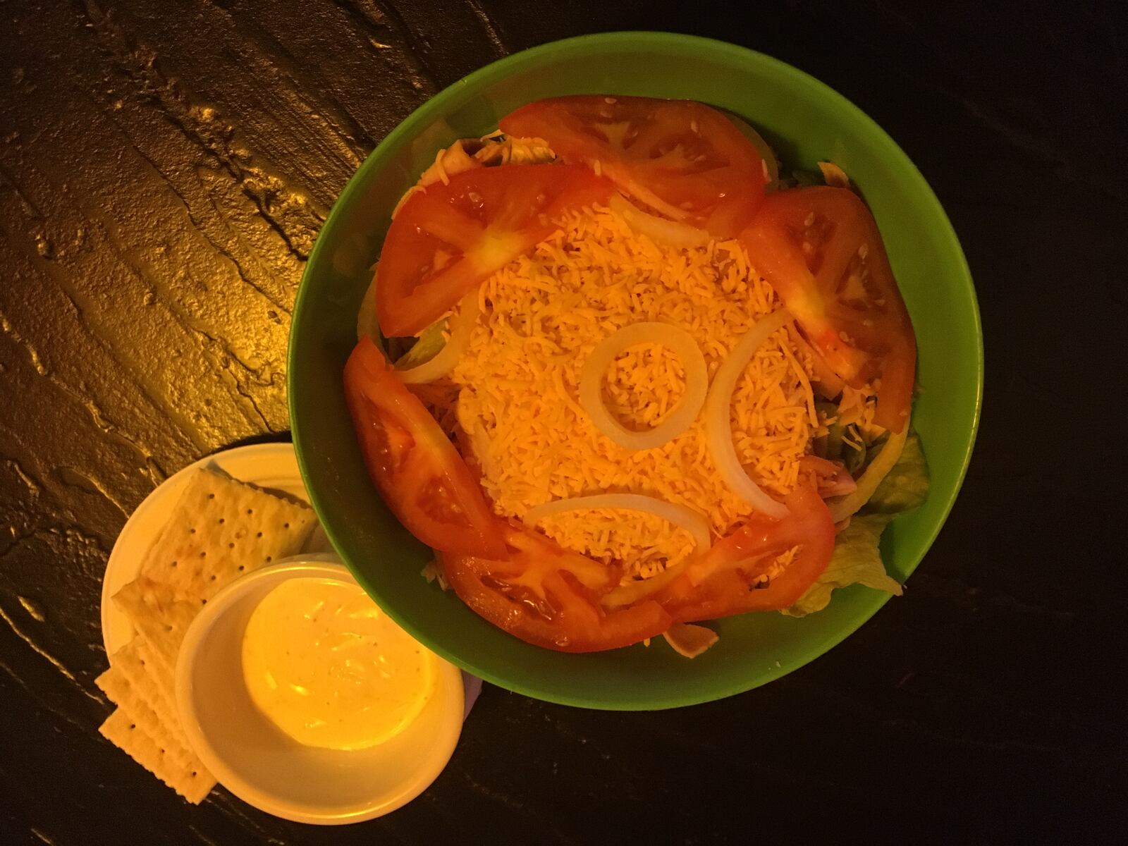 You might laugh at the idea of going to a bar for the salad, but you can wash it down with whatever you'd like regardless.