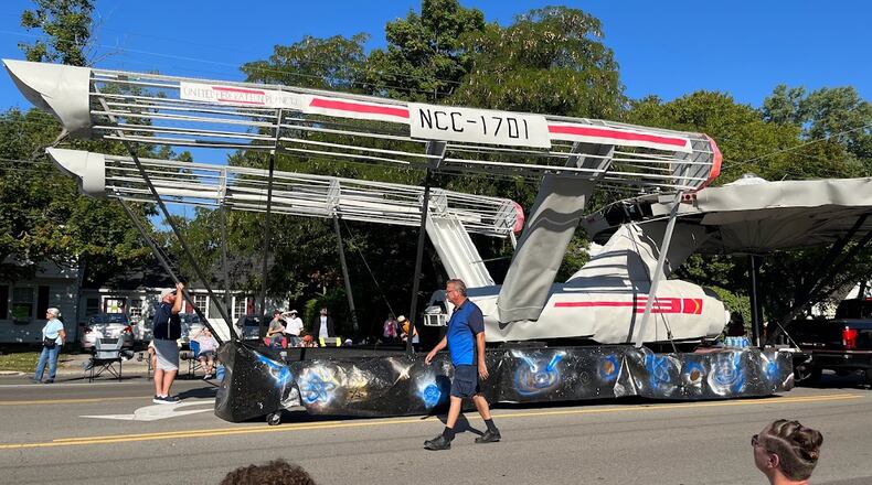 Fairmont Kettering High School biology teacher Steve Cotrone and his friends created this replica of the Star Trek USS Enterprise in his backyard for last year's Holiday at Home parade. This year's event on Monday in Kettering includes more than 117 entries, including 17 floats, organizers said. THOMAS GNAU/STAFF