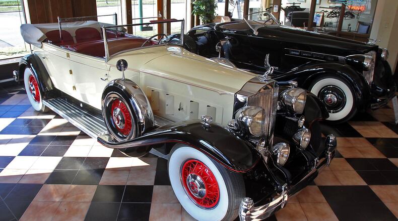 A  1930 Packard Model 734 Boat Tail Speedster sits in the showroom of America's Packard Museum.  Offered in five different body styles, only 39 Boat Tail cars were built and it is believed that only 11 survive.  Capable of speeds over 100 mph, the 4,250 lb. car cost $5,200.
©  Photograph by Skip Peterson
