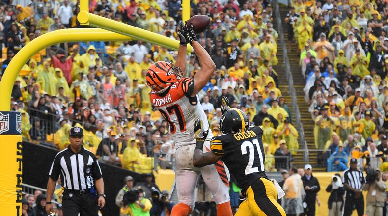 PITTSBURGH, PA - SEPTEMBER 18: C.J. Uzomah #87 of the Cincinnati Bengals cannot make a catch while being defended by Robert Golden #21 of the Pittsburgh Steelers in the second half during the game at Heinz Field on September 18, 2016 in Pittsburgh, Pennsylvania. (Photo by Joe Sargent/Getty Images)