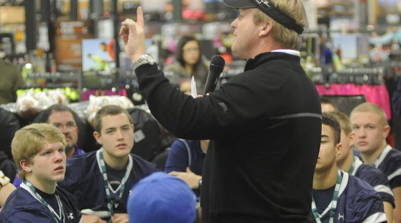ESPN Monday Night Football analyst Jon Gruden makes a point. Gruden presented donation checks and equipment generated by DICK’S Sporting Goods and the DICK’S Sporting Goods Foundation “Sports Matter” to 10 area high school football programs at Dick’s at The Mall at Fairfield Commons in 2014. MARC PENDLETON / STAFF