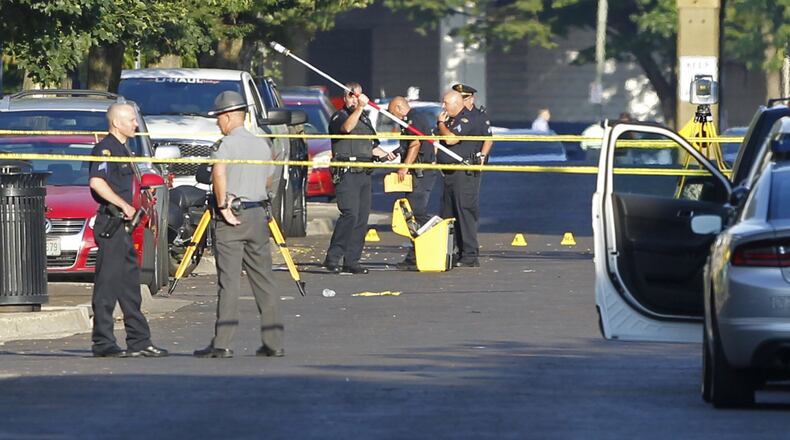 Scene in the Oregon District where 10 people were killed, including the shooter, in a mass shooting that also injured more than two dozen others. The shooting took place in the 400 block of East Fifth Street at 1:07 A.M. TY GREENLEES / STAFF