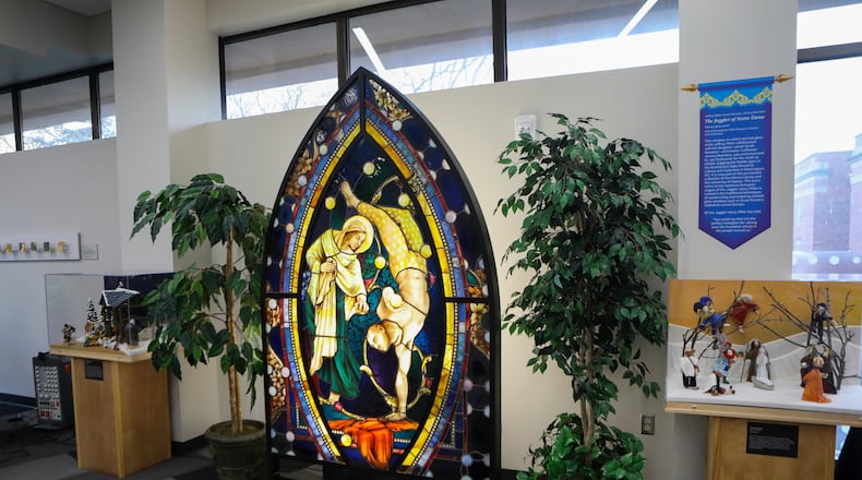 This stained glass window was donated to the Marian Library in honor of the current juggling exhibit. It’s titled “The Juggler of Notre Dame” by Jeffrey Miller.  CONTRIBUTED