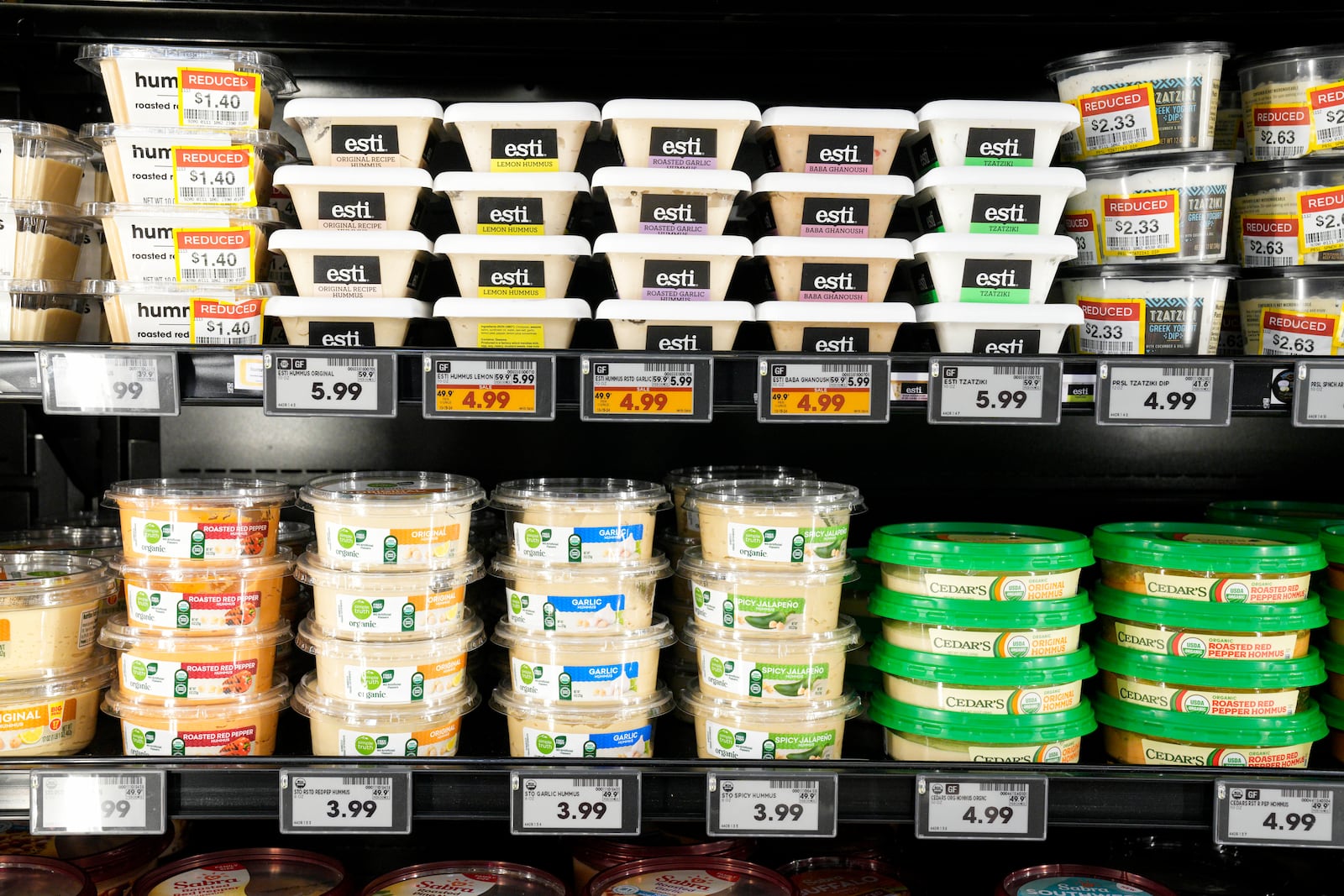 Electronic grocery labels are displayed at a Kroger grocery store, in Monroe, Ohio, Nov. 13, 2024. (AP Photo/Jeff Dean)