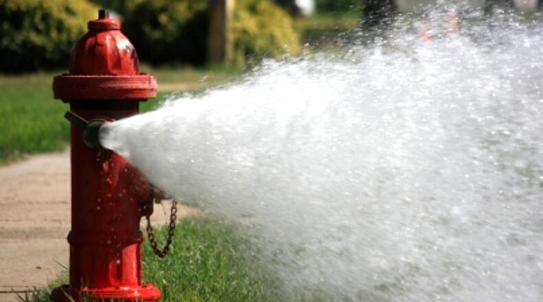 Fire Department hydrant flushing in Sandy Springs in the coming weeks could result in some residents seeing discolored water coming out of their taps. AJC FILE