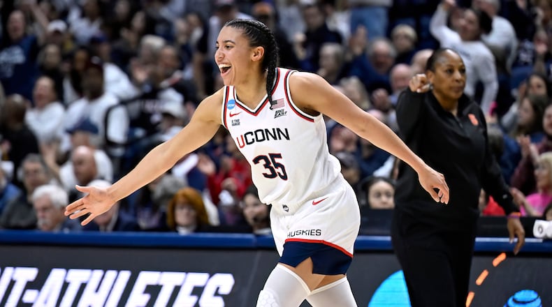 UConn guard Azzi Fudd (35) reacts after making a 3-point basket during the first half in the second round of the NCAA college basketball tournament against Syracuse, Monday, March 23, 2026, in Storrs, Conn. (AP Photo/Jessica Hill)