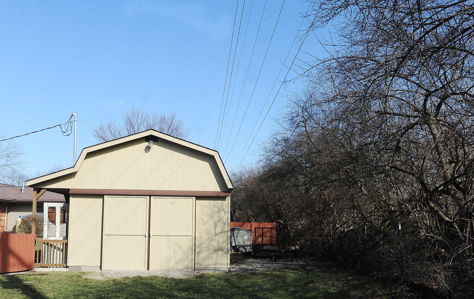 Property owner Kim Younce of Carlisle will have to remove her barn due to Duke Energy's enforcing a utility easement along its transmission lines. MARSHALL GORBY\STAFF