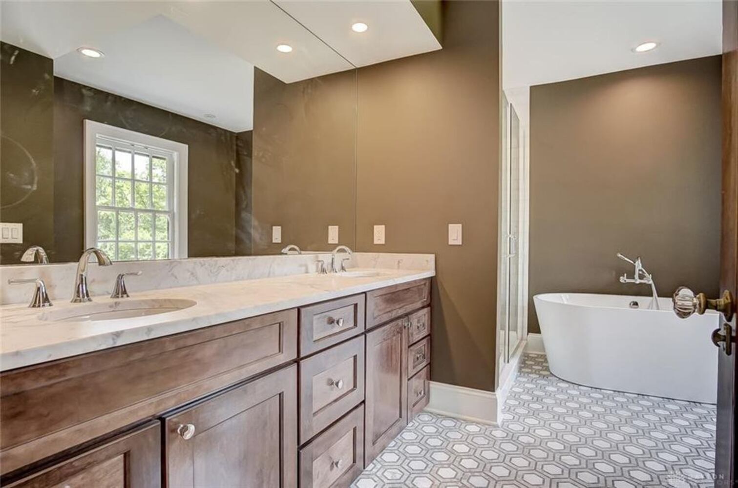 PHOTOS: Luxury, renovated Oakwood Tudor home on market for nearly $1.2M
