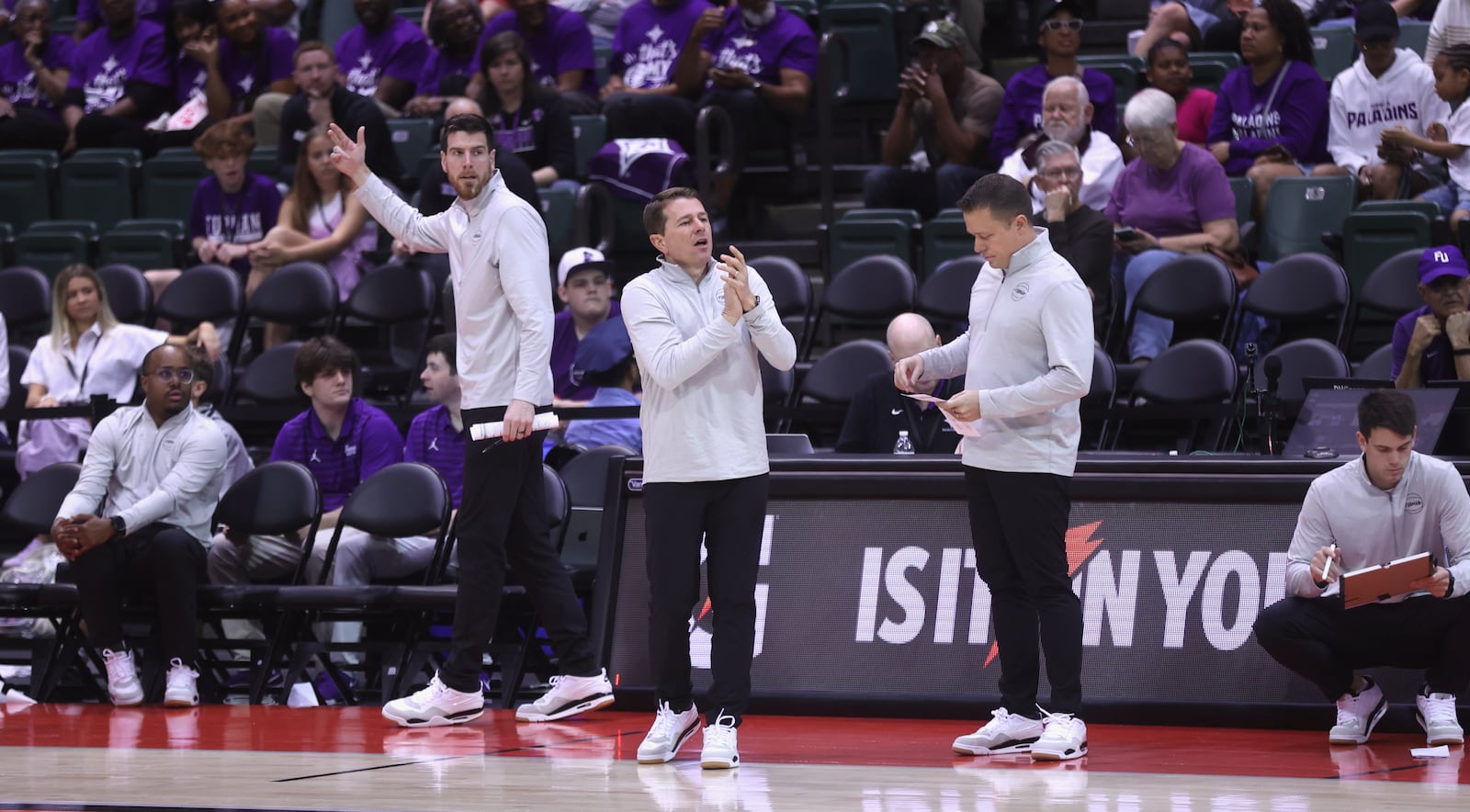 Former Cedarville University coach Pat Estepp, claps, during Furman's game against Richmond in the first round of the ESPN Events Invitational on Thursday, Nov. 27, 2025, at the State Farm Field House in Kissimmee, Fla. David Jablonski/Staff