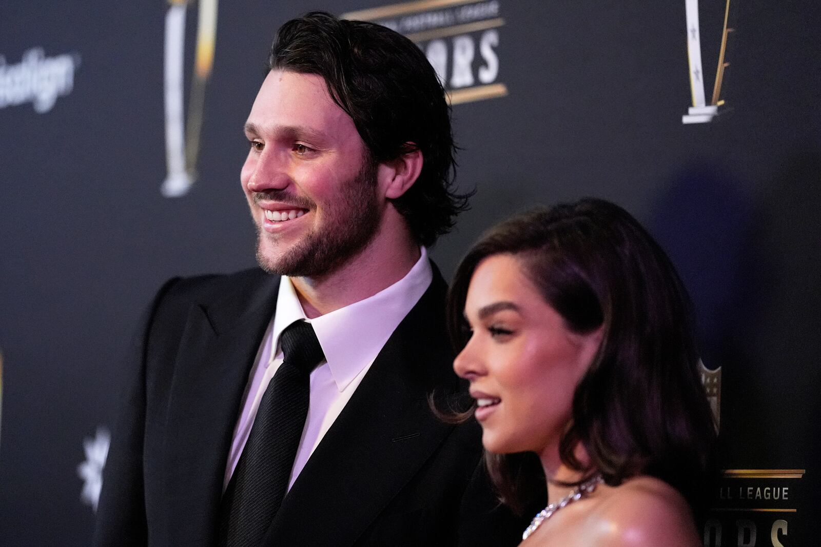 FILE - Josh Allen, of the Buffalo Bills, and his fiancé, Hailee Steinfeld, pose on the red carpet at the NFL Honors award show ahead of the Super Bowl 59 football game, Thursday, Feb. 6, 2025, in New Orleans. (AP Photo/Brynn Anderson, File)